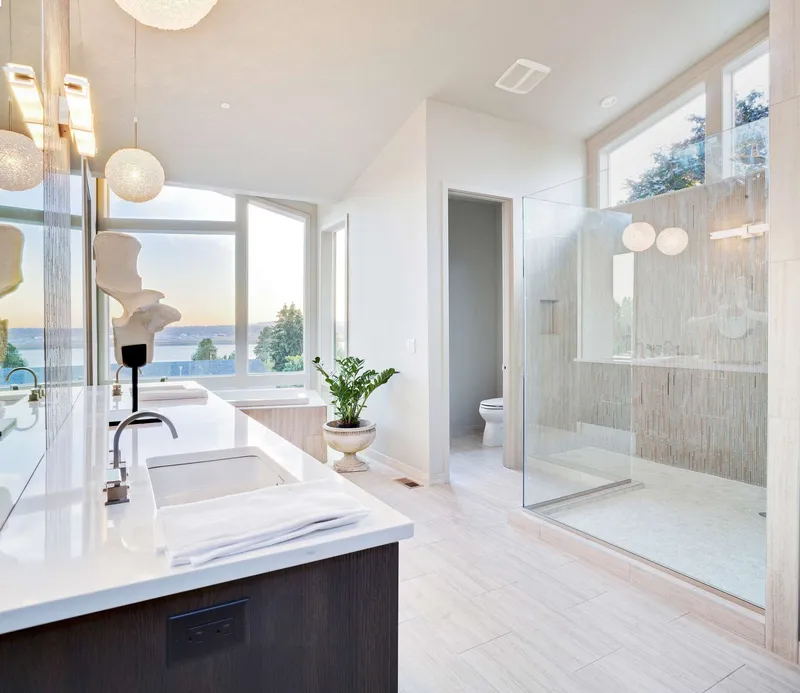 Bright bathroom with a glass shower enclosure
