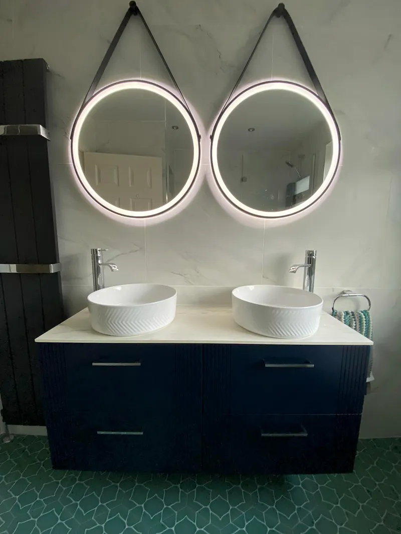 Navy double vanity with twin basins