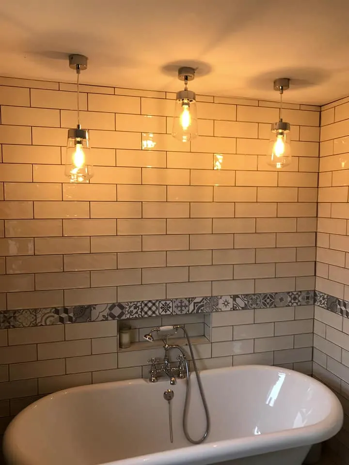 Bath under warm pendant lights